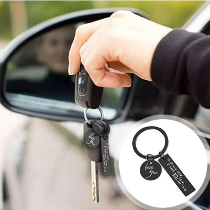 Stainless steel ‘Drive Safe’ keychain with black engraved lettering.