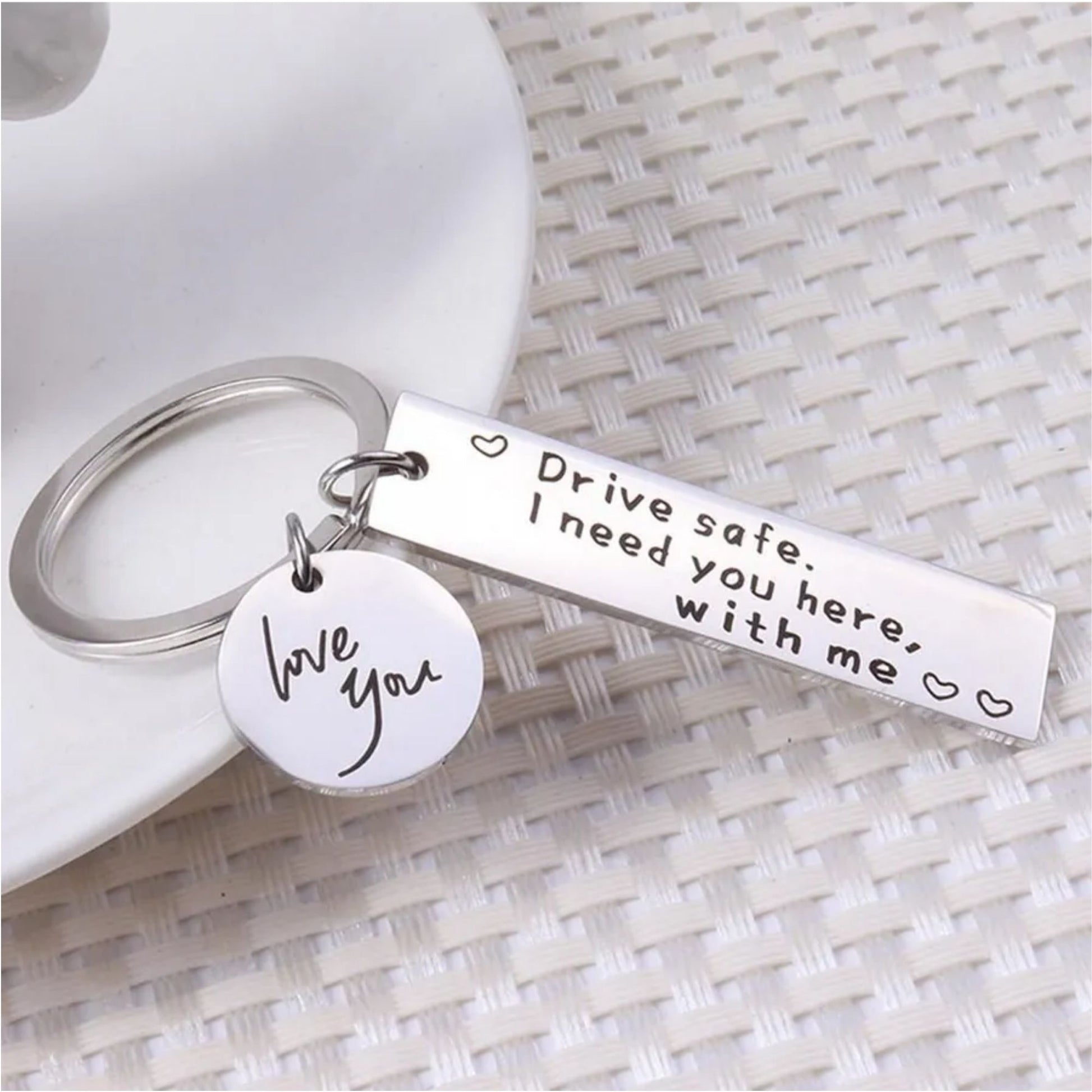 Stainless steel ‘Drive Safe’ keychain with black engraved lettering..